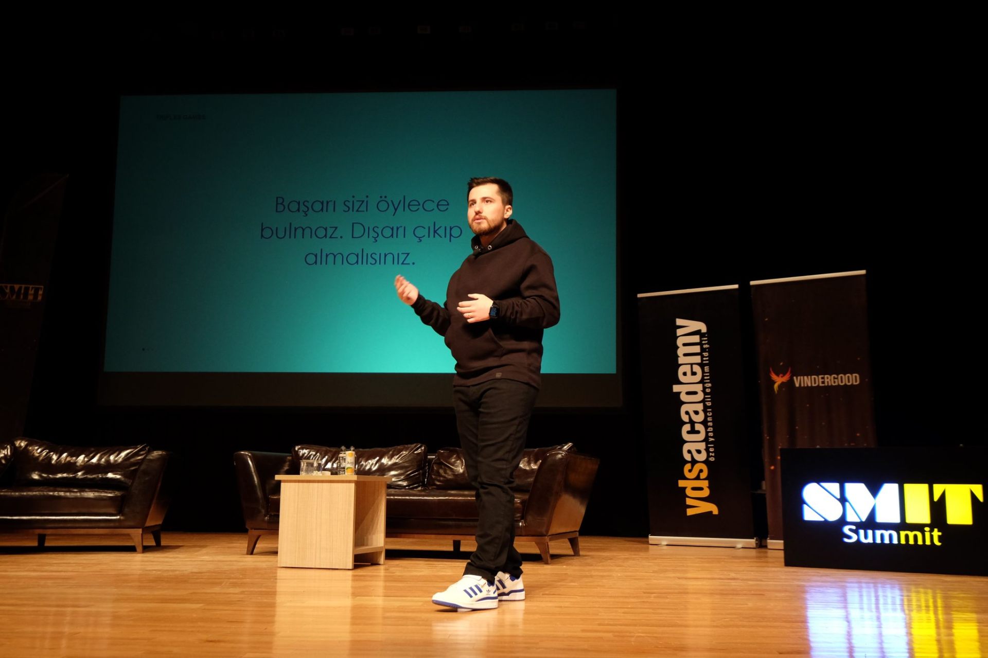 Gökhan KINAY speaking on stage about building Trifles Games from $0 to $1M